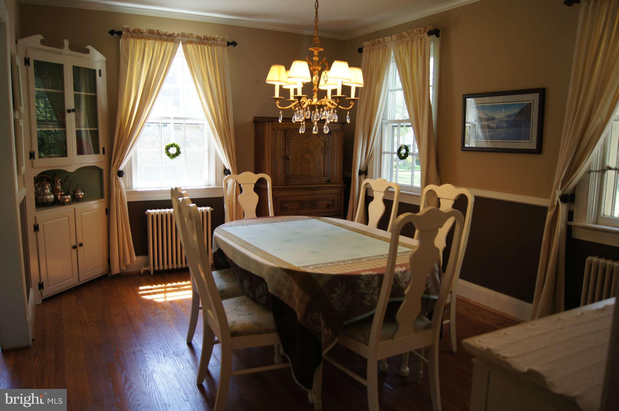 206 North Rolling Road Baltimore, MD 21228 - Photo 8 of 30 Dining Room with original chandelier