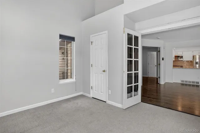 an empty room with windows