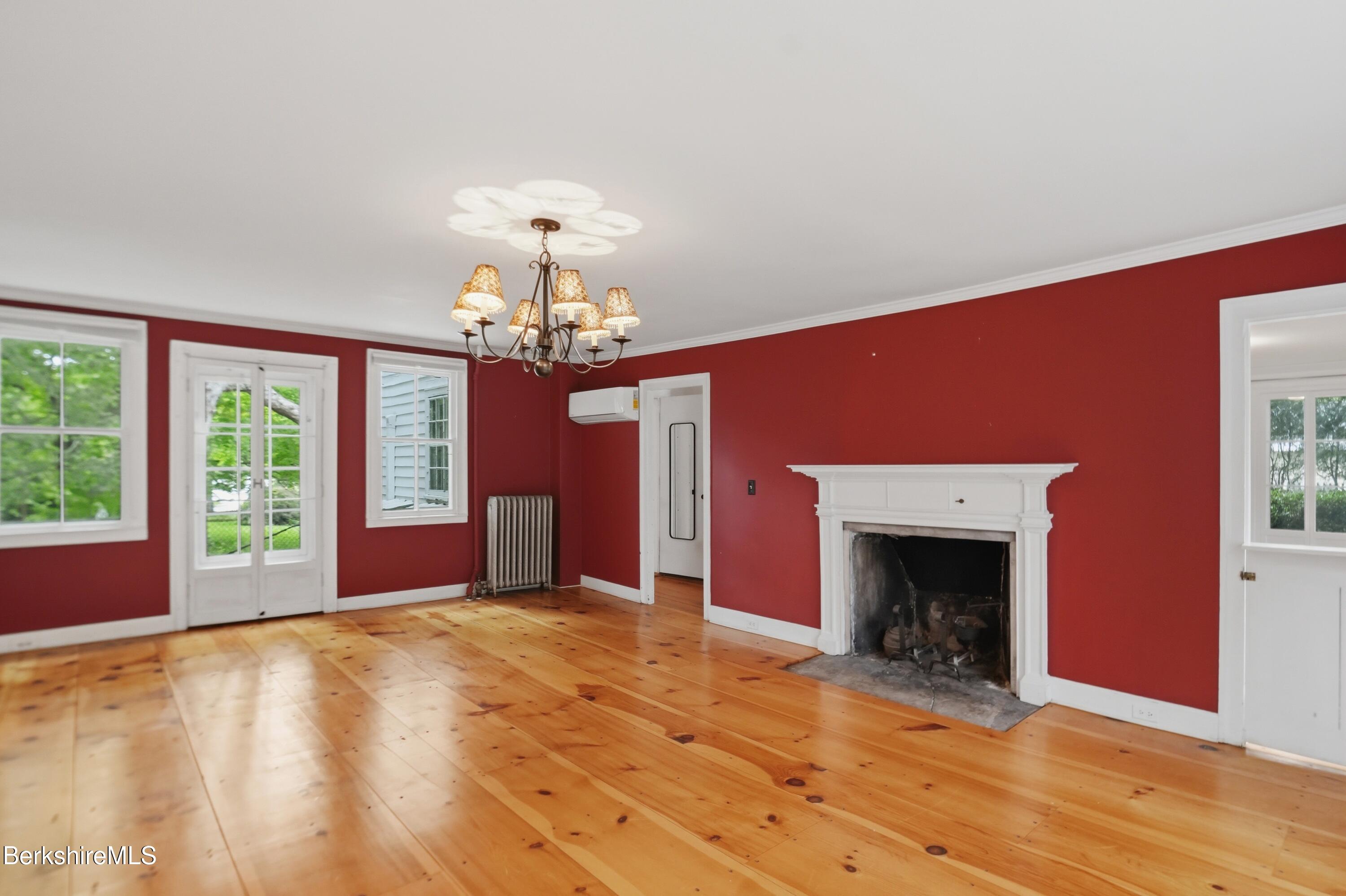 4 Stockbridge Road West Stockbridge, MA 01266 - Photo 24 of 94 a view of an empty room with window and fireplace
