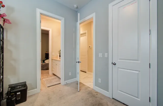 a view of a room with a wardrobe space