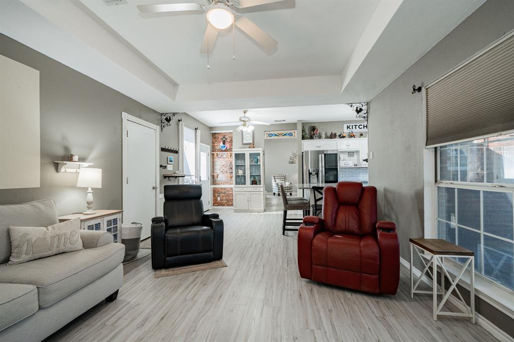508 Tishomingo Road Waxahachie, TX 75165 - Photo 15 of 26 a living room with furniture and a flat screen tv