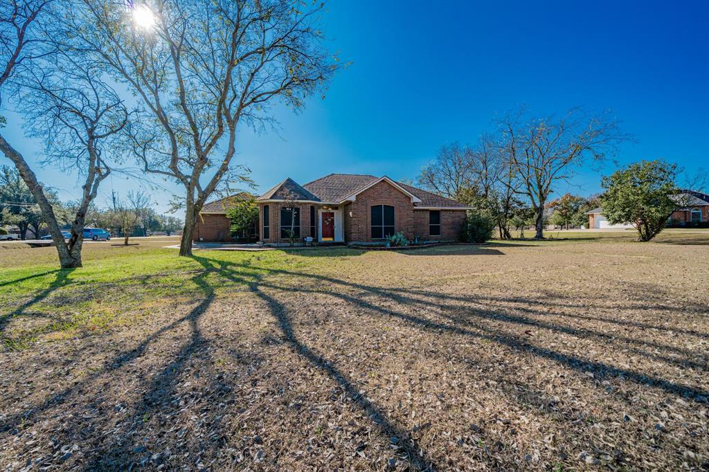 508 Tishomingo Road Waxahachie, TX 75165 - Photo 2 of 26 a view of a house with a yard