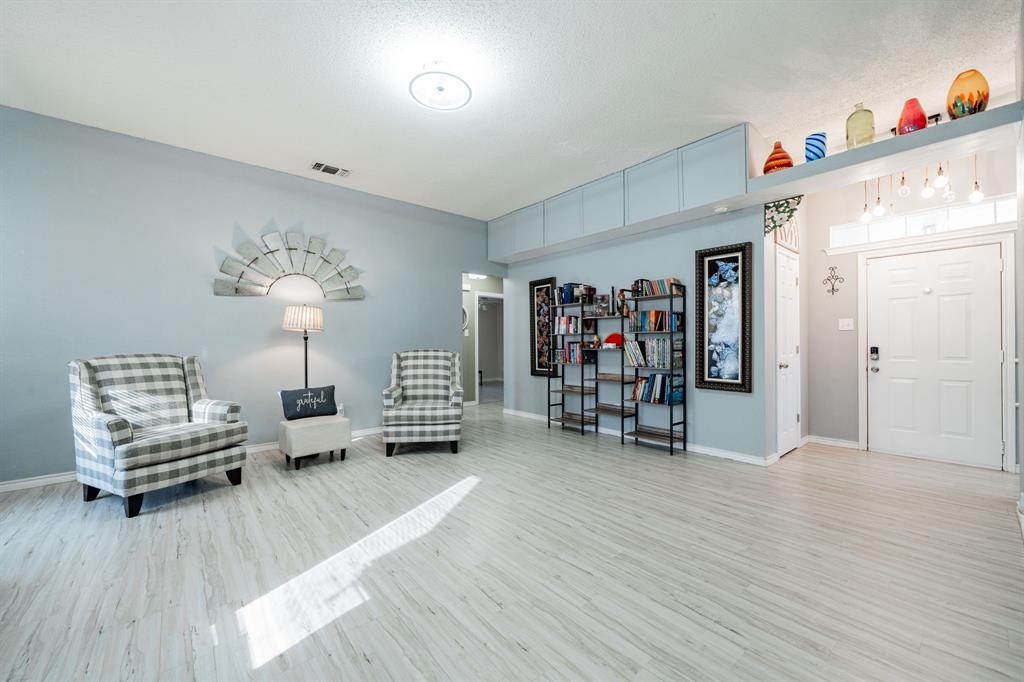 508 Tishomingo Road Waxahachie, TX 75165 - Photo 3 of 26 a view of livingroom with furniture and wooden floor