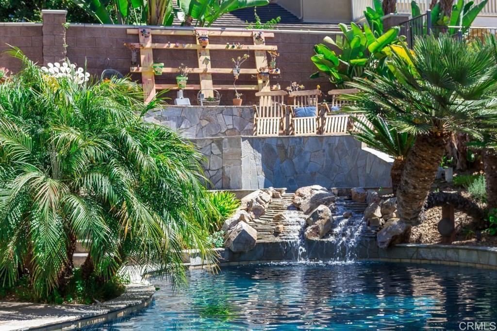 1499 Paseo De Las Flores Encinitas, CA 92024 - Photo 15 of 30 a view of a house with a yard