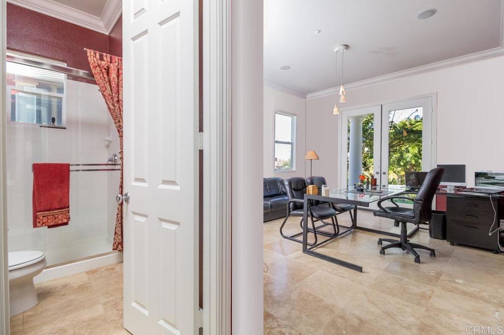 1499 Paseo De Las Flores Encinitas, CA 92024 - Photo 19 of 30 a view of a workspace with furniture and a window