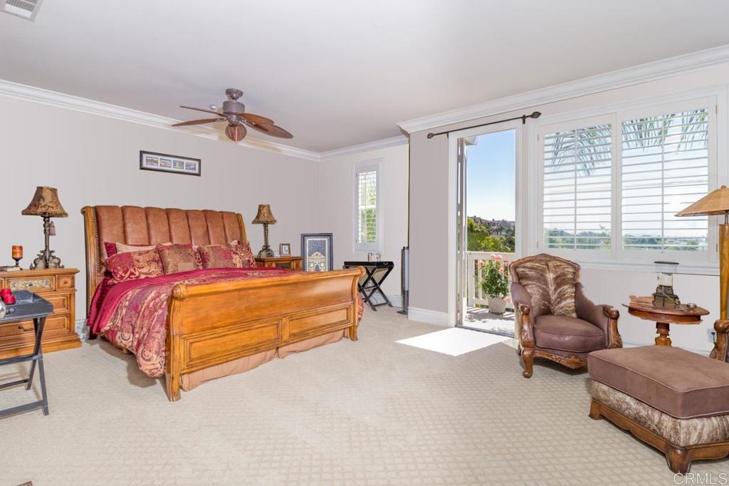 1499 Paseo De Las Flores Encinitas, CA 92024 - Photo 20 of 30 a bed room with a bed and a couch