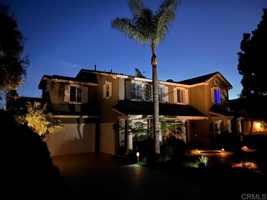 1499 Paseo De Las Flores Encinitas, CA 92024 - Photo 4 of 30 a front view of a house with a yard