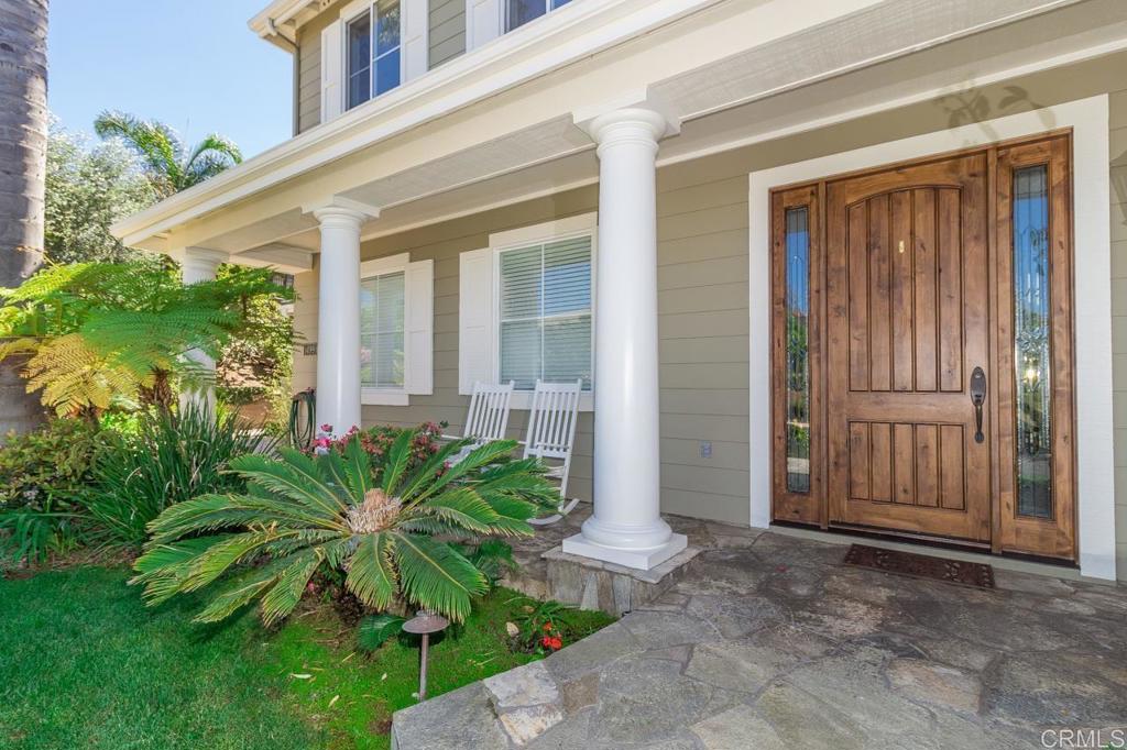 1499 Paseo De Las Flores Encinitas, CA 92024 - Photo 5 of 30 front view of a house with a yard