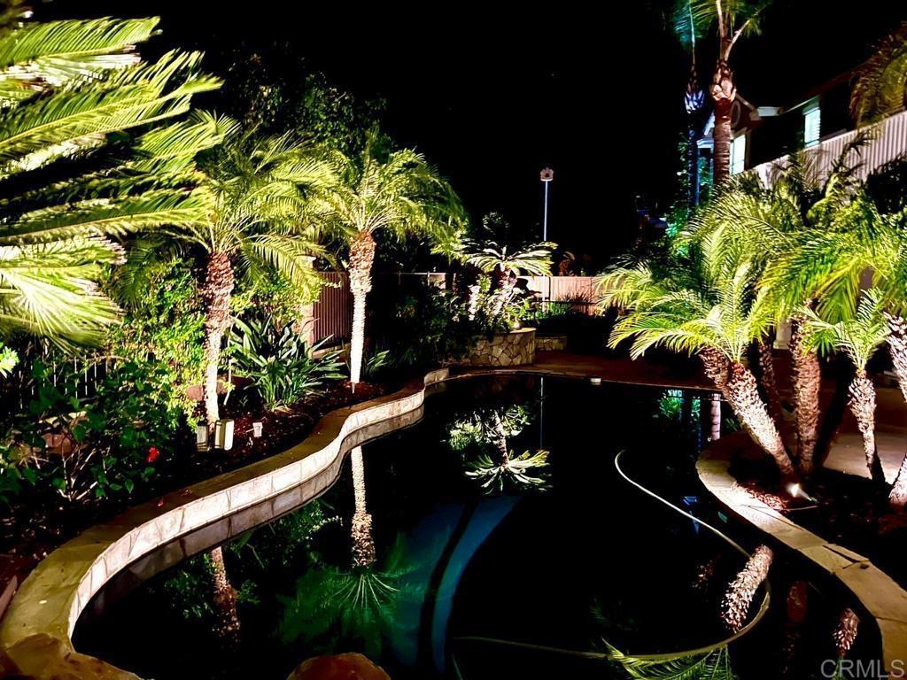 1499 Paseo De Las Flores Encinitas, CA 92024 - Photo 7 of 30 a vase of flowers sitting on a table