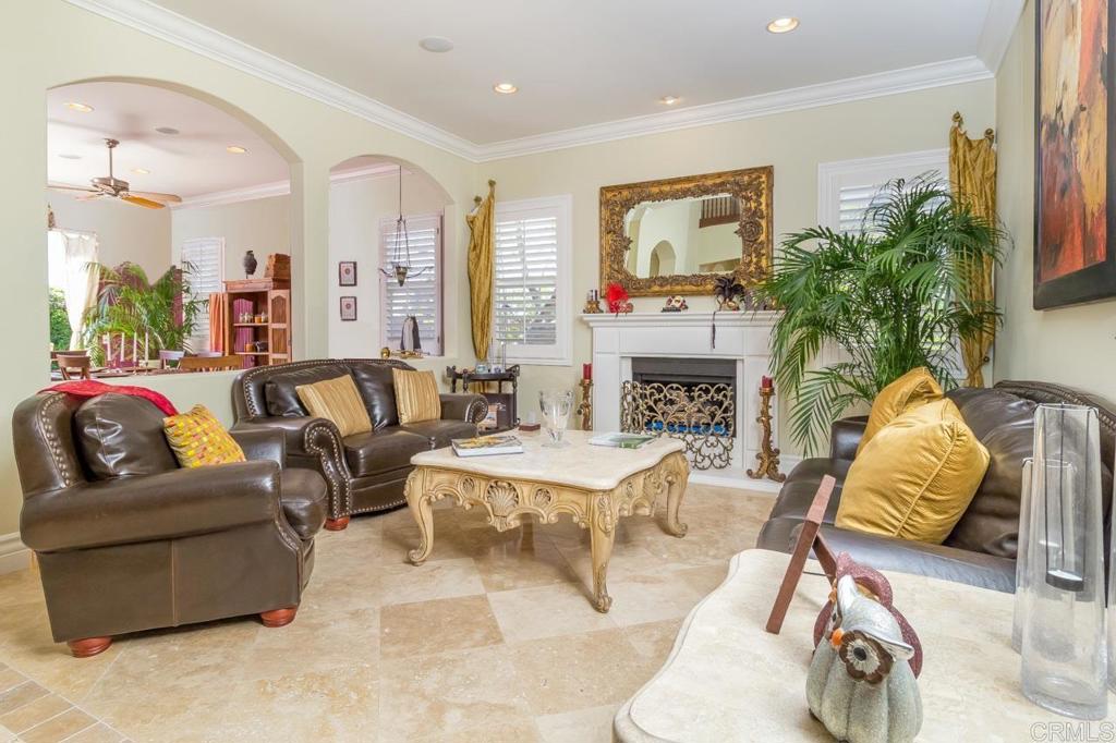 1499 Paseo De Las Flores Encinitas, CA 92024 - Photo 8 of 30 a living room with furniture and a fireplace