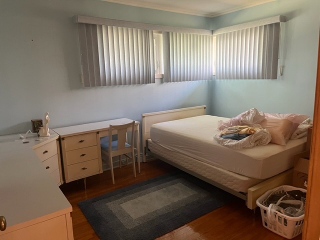 1027 Whitfield Road Northbrook, IL 60062 - Photo 14 of 21 a bedroom with a bed and a dresser