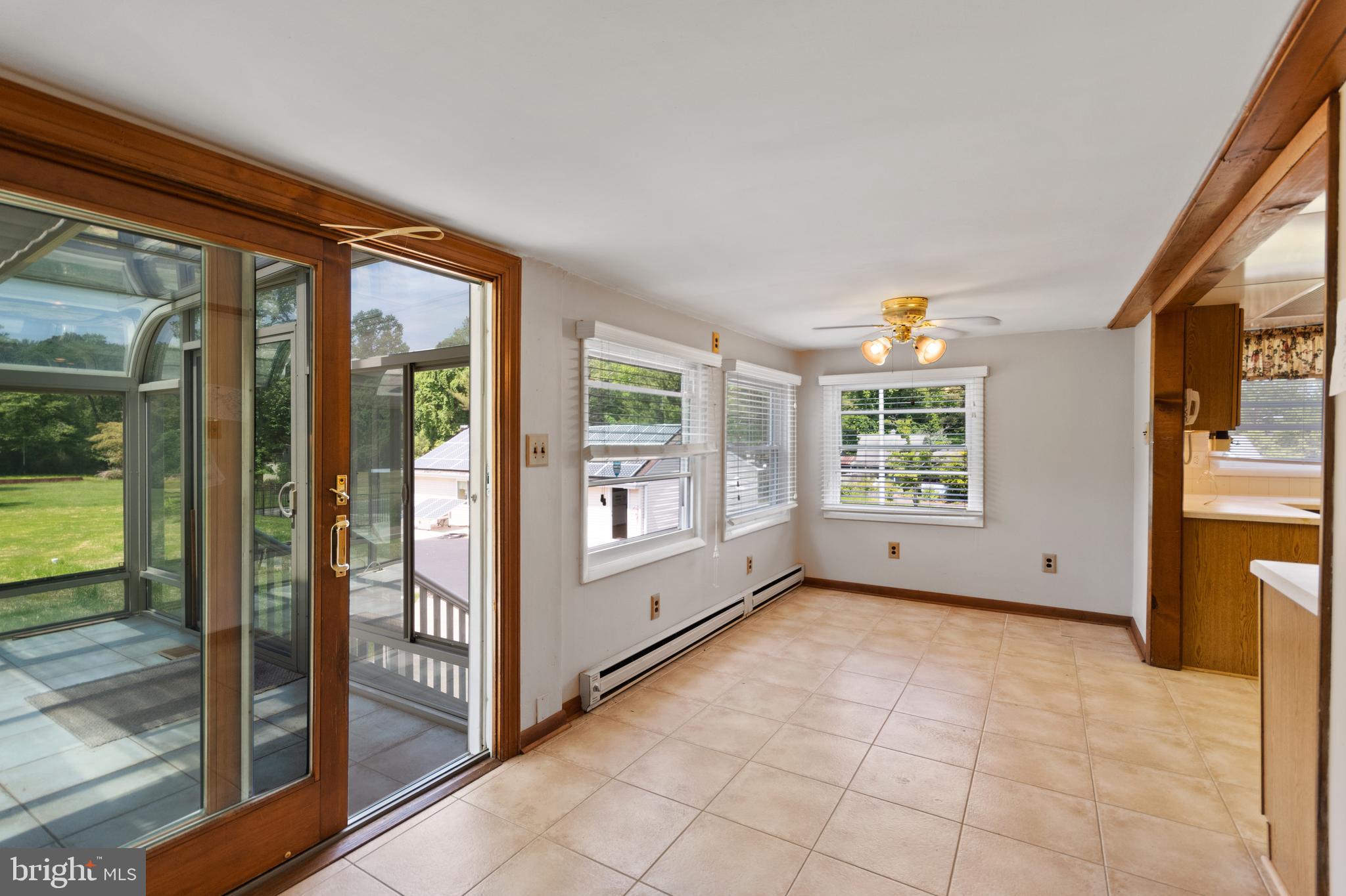 560 Church Road Sewell, NJ 08080 - Photo 17 of 38 Breakfast room /Great room to sunroom