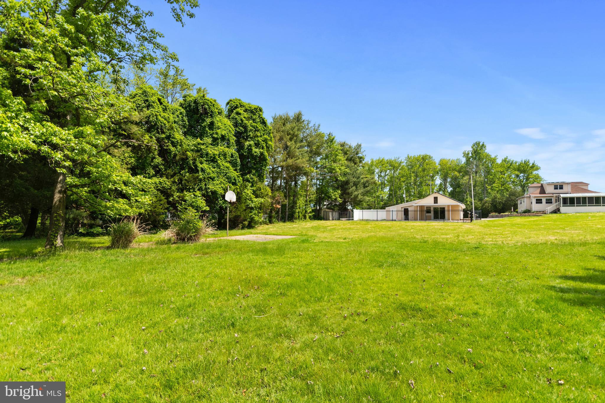 560 Church Road Sewell, NJ 08080 - Photo 10 of 38 Back View from Pond and view of Basketball court