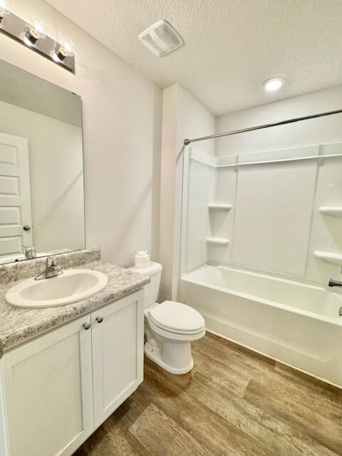 5414 Merlin Milton, FL 32583 - Photo 11 of 35 a bathroom with a granite countertop sink toilet a mirror and shower