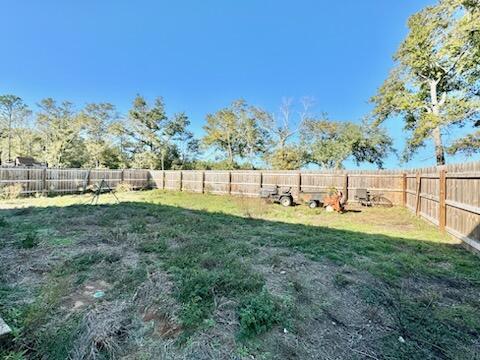 5414 Merlin Milton, FL 32583 - Photo 13 of 35 a view of yard with grass and trees