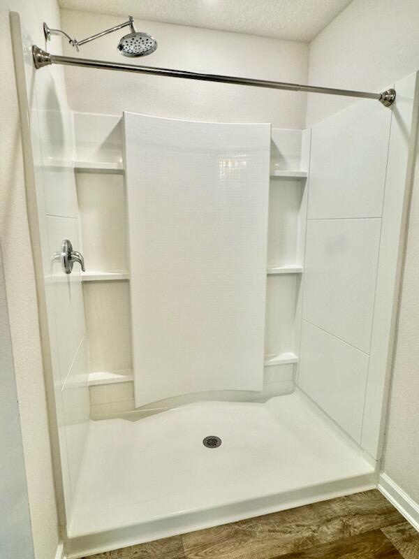 5414 Merlin Milton, FL 32583 - Photo 17 of 35 a bathroom with a shower