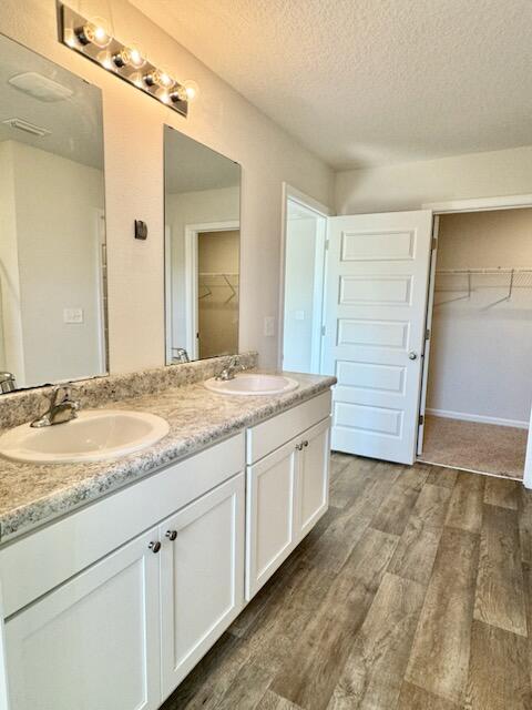5414 Merlin Milton, FL 32583 - Photo 18 of 35 a bathroom with a granite countertop sink and a mirror