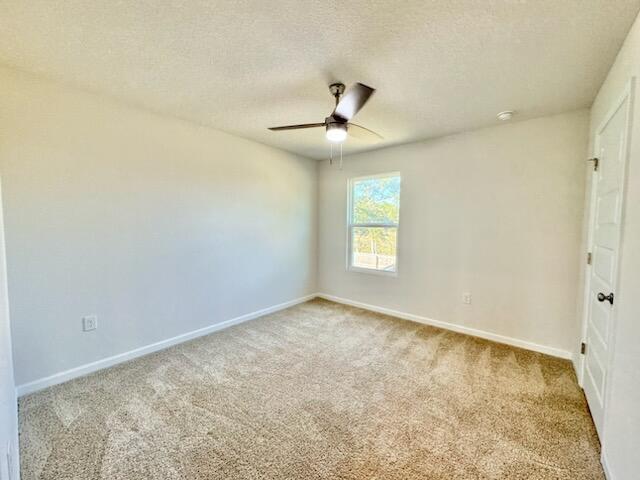 5414 Merlin Milton, FL 32583 - Photo 27 of 35 an empty room with a window and a ceiling fan