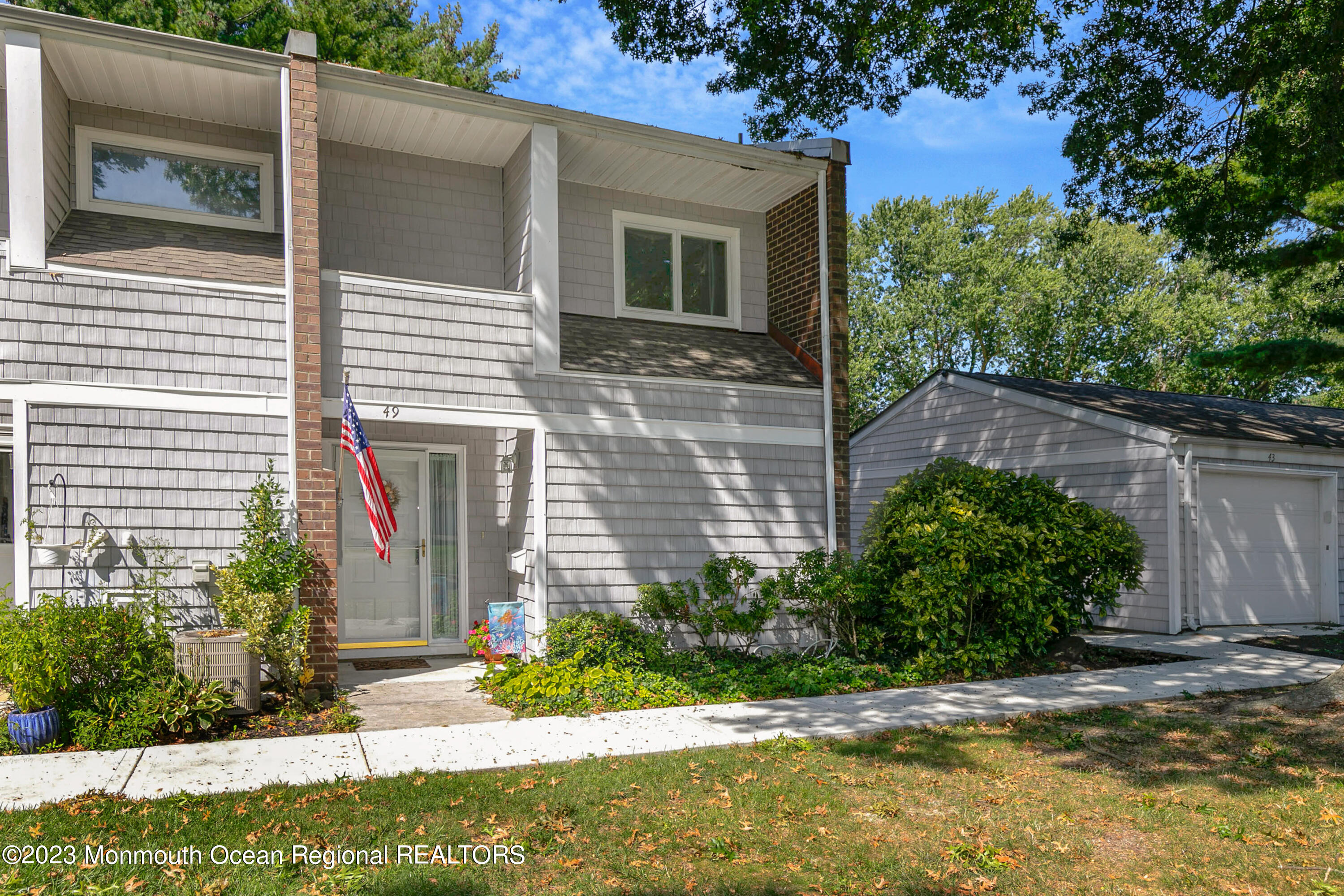 49 Locust Way Spring Lake Heights, NJ 07762 - Photo 1 of 34 a view of a house with a yard