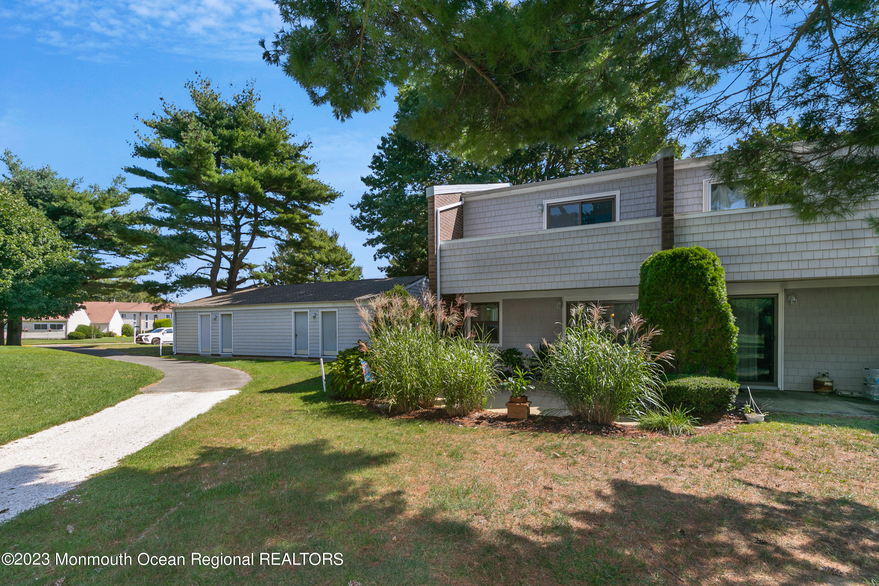49 Locust Way Spring Lake Heights, NJ 07762 - Photo 29 of 34 a view of a back yard with plants and trees