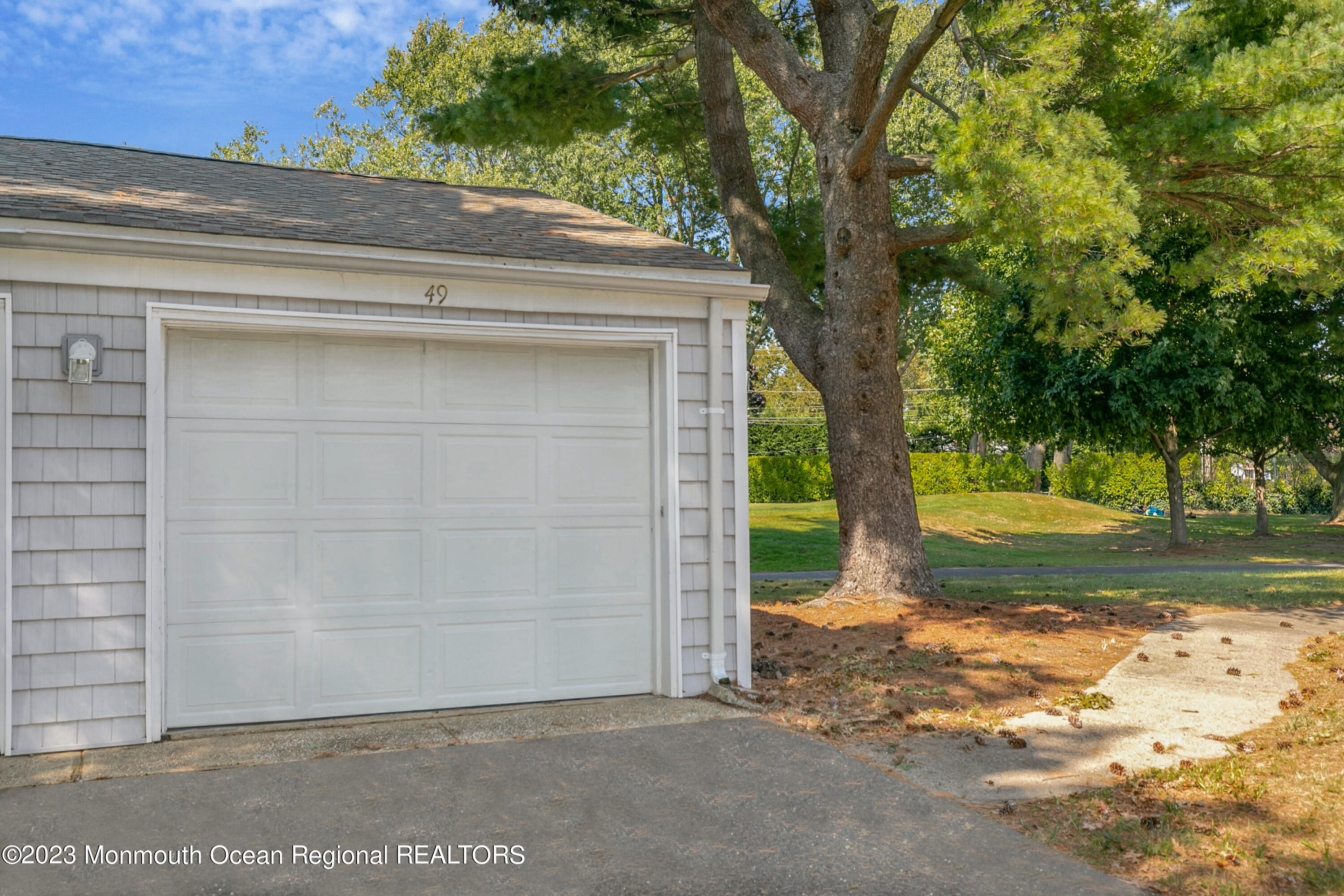 49 Locust Way Spring Lake Heights, NJ 07762 - Photo 30 of 34 a view of a house with a tree