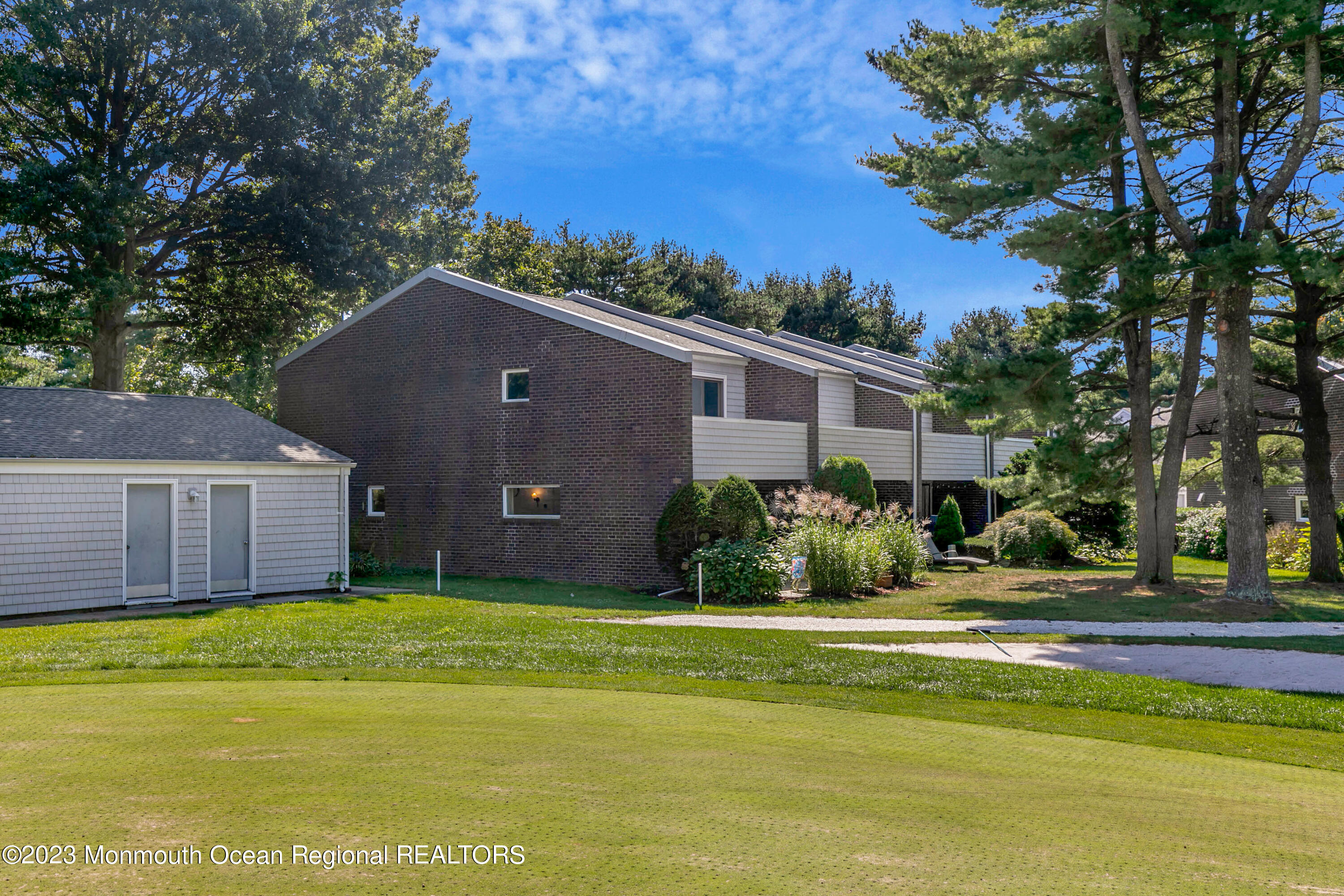 49 Locust Way Spring Lake Heights, NJ 07762 - Photo 34 of 34 a house view with a garden space