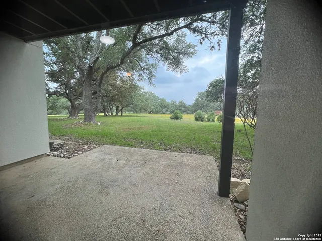 a view of a yard with porch
