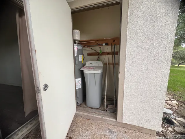 a view of a storage & utility room with washer and dryer