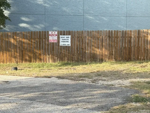 a view of swimming pool and a yard