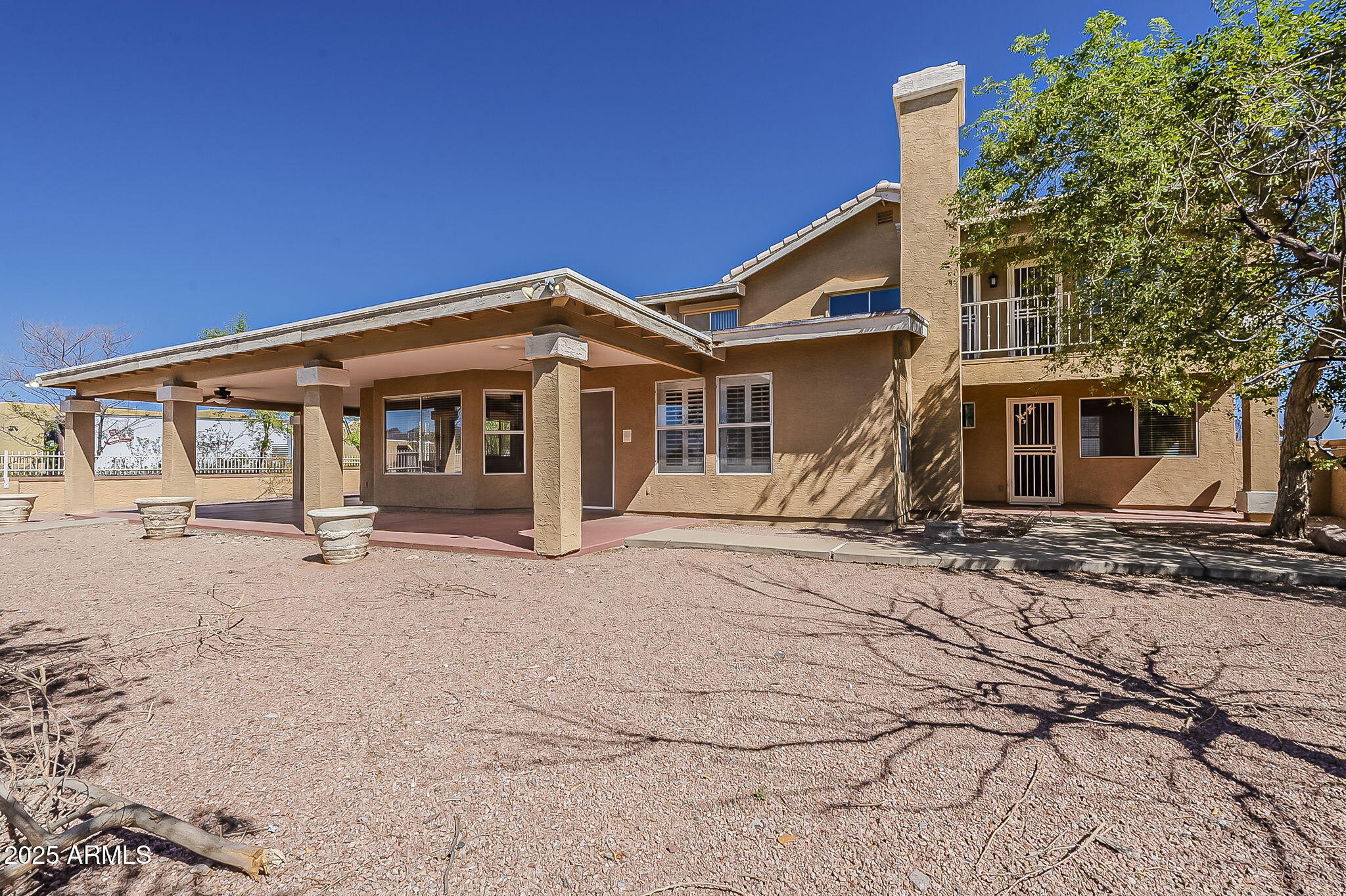 1410 North Goldfield Road Apache Junction, AZ 85119 - Photo 33 of 45 a front view of a house with garden