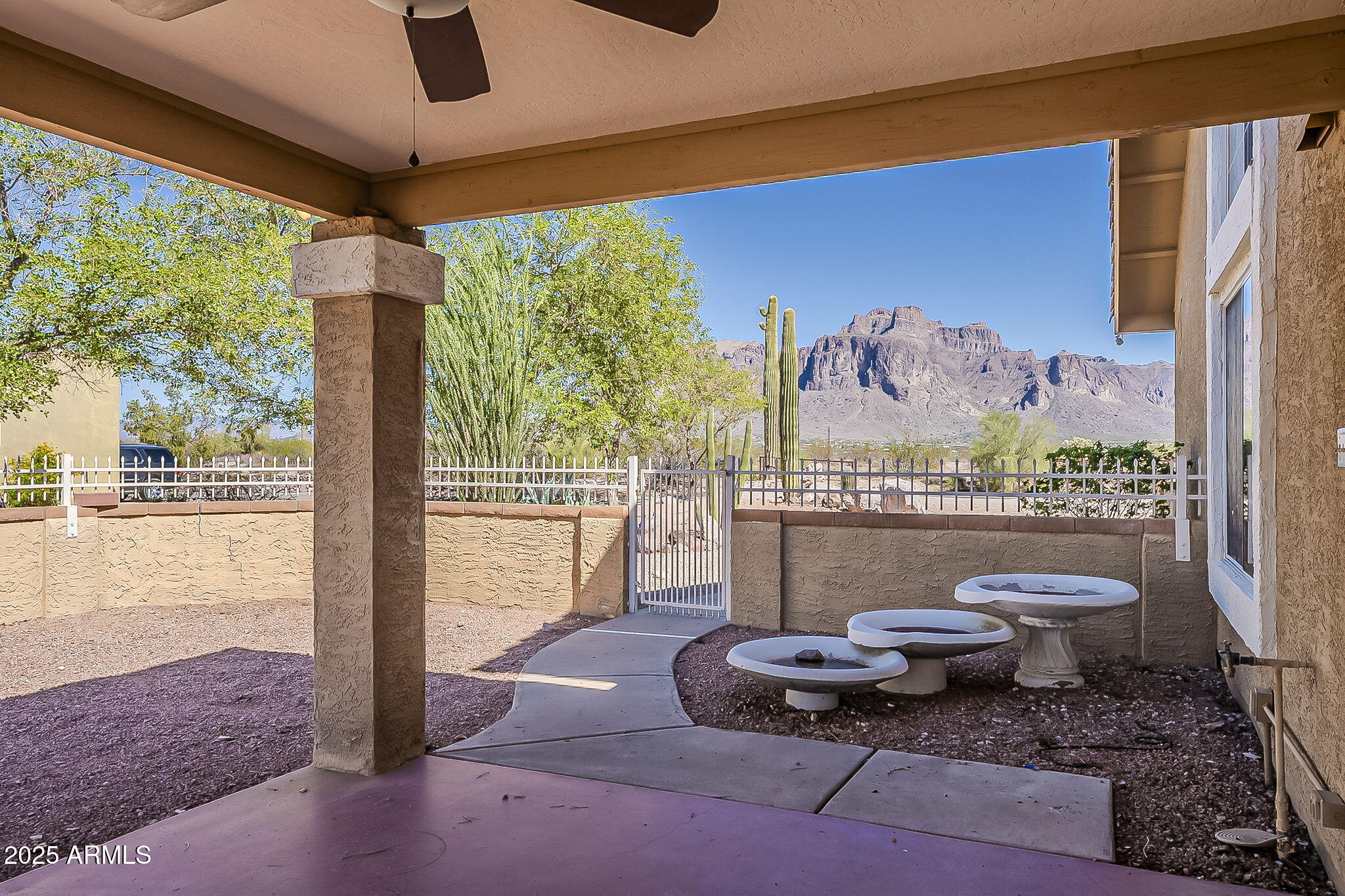 1410 North Goldfield Road Apache Junction, AZ 85119 - Photo 35 of 45 a living room with furniture and a large window