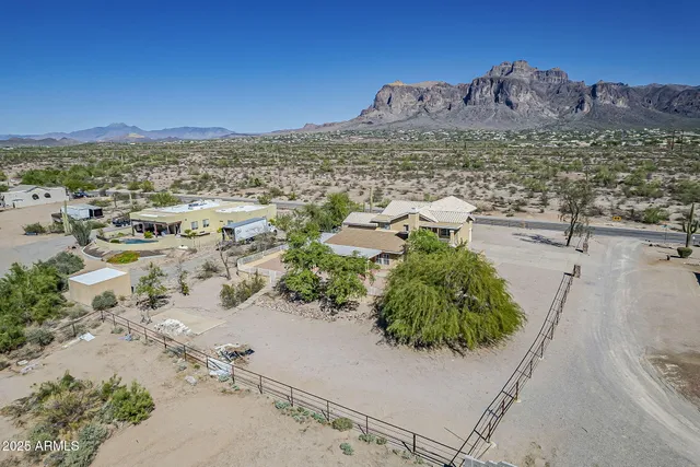 a view of a terrace with wooden floor and a ocean view