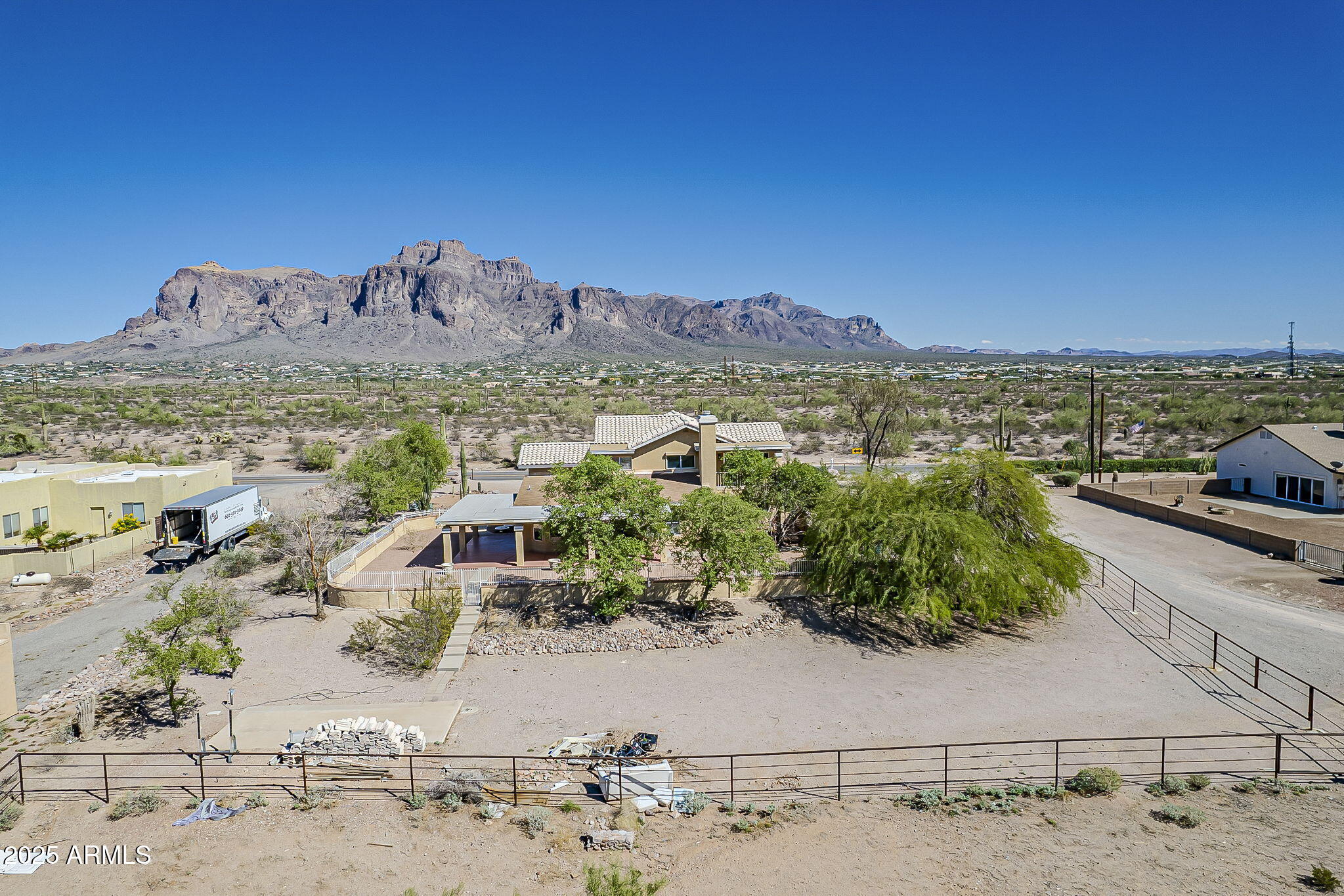 1410 North Goldfield Road Apache Junction, AZ 85119 - Photo 39 of 45 a view of a terrace with wooden floor and a ocean view