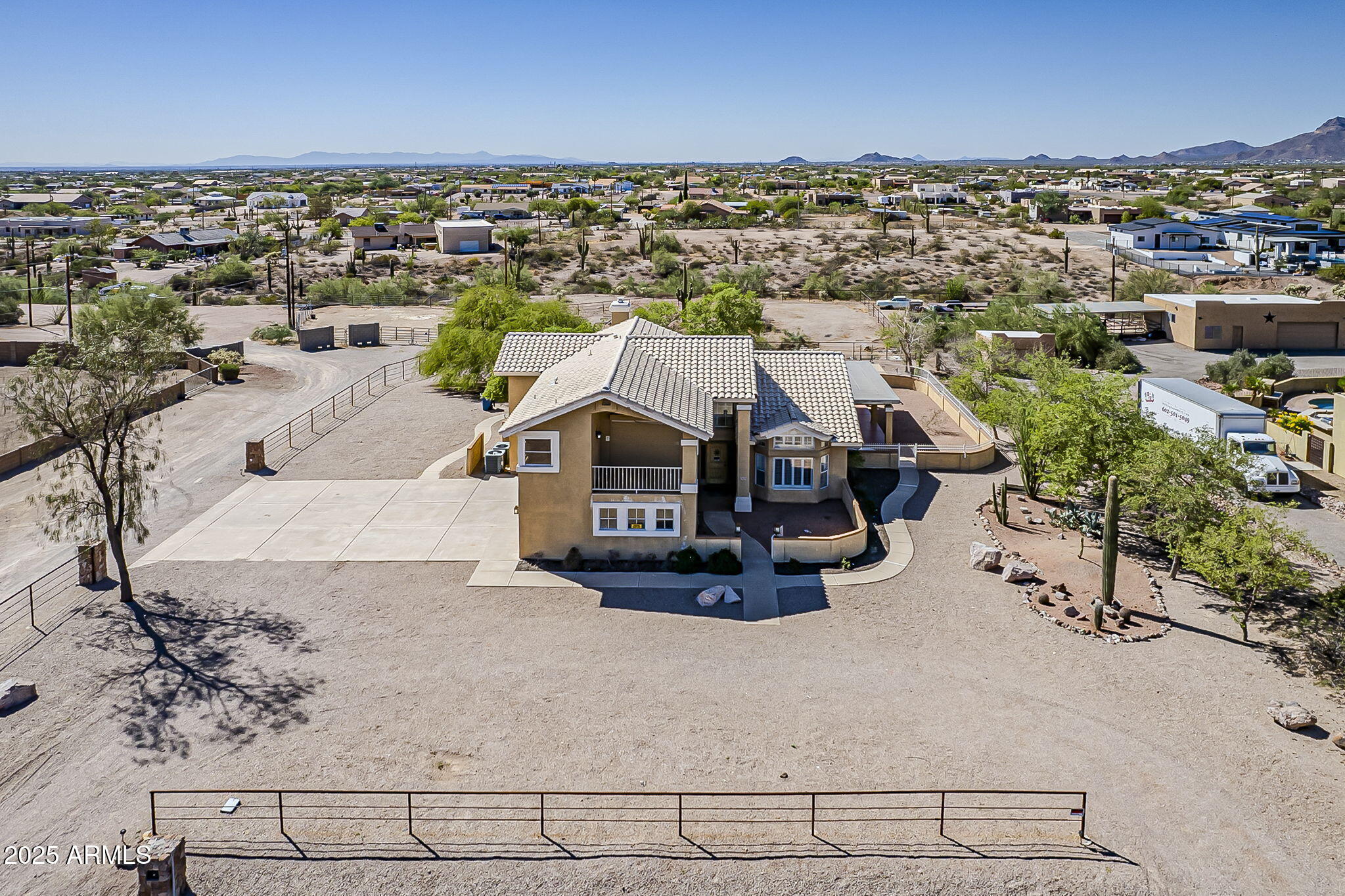 1410 North Goldfield Road Apache Junction, AZ 85119 - Photo 6 of 45 an aerial view of residential houses with outdoor space