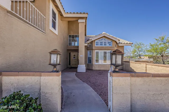 a view of a brick building with many windows