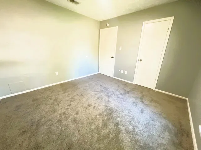 an empty room with a natural light