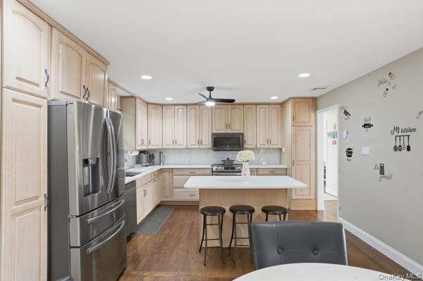 31 Laura Road Monroe, NY 10950 - Photo 9 of 39 a kitchen with kitchen island a sink appliances and cabinets
