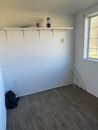 a view of small space with racks on the wall