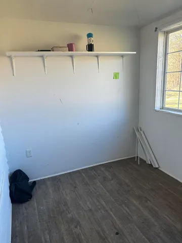 a view of small space with racks on the wall