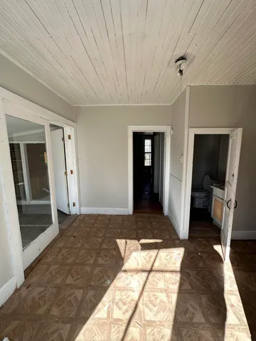 a view of hallway with walk in closet