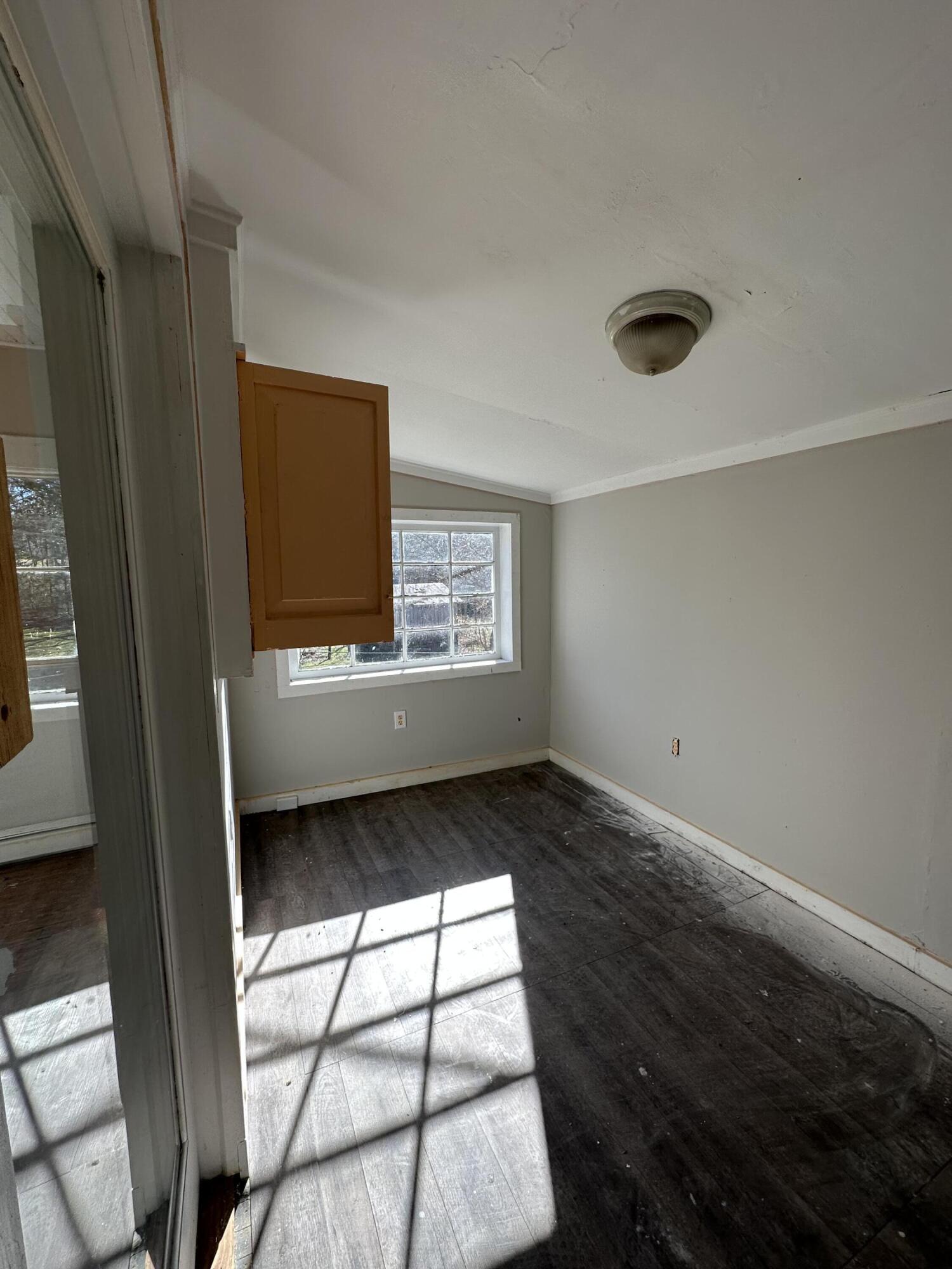 579-581 Botetourt Road Fincastle, VA 24090 - Photo 23 of 30 a view of an empty room with a window