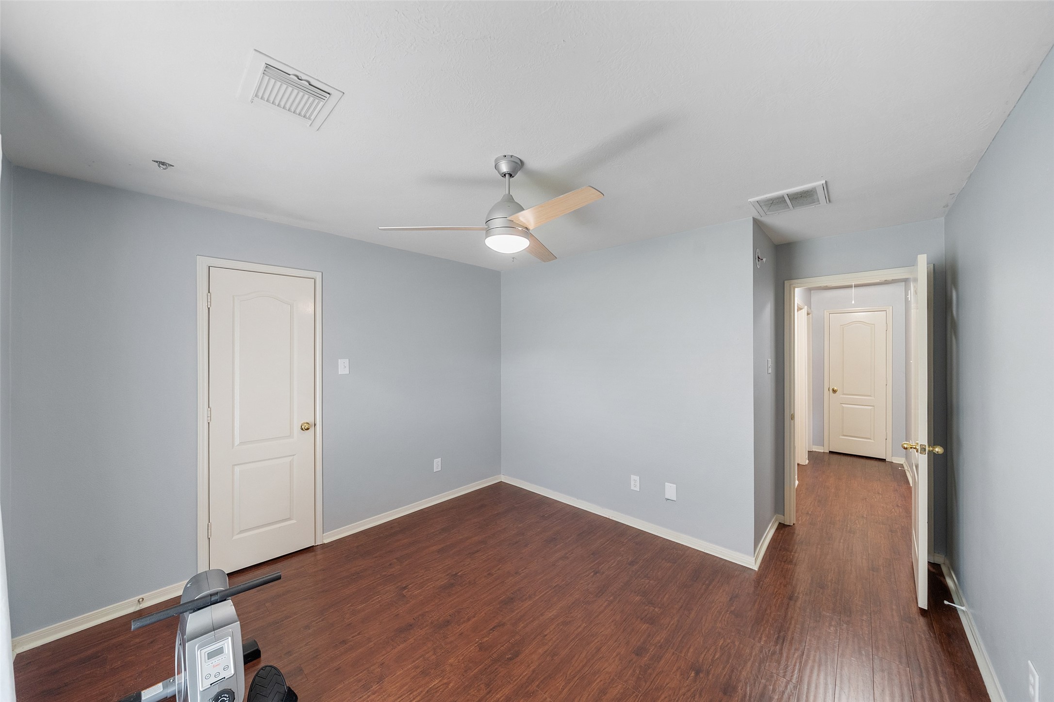 19718 Teller Boulevard Spring, TX 77388 - Photo 26 of 47 wooden floor in an empty room with a window