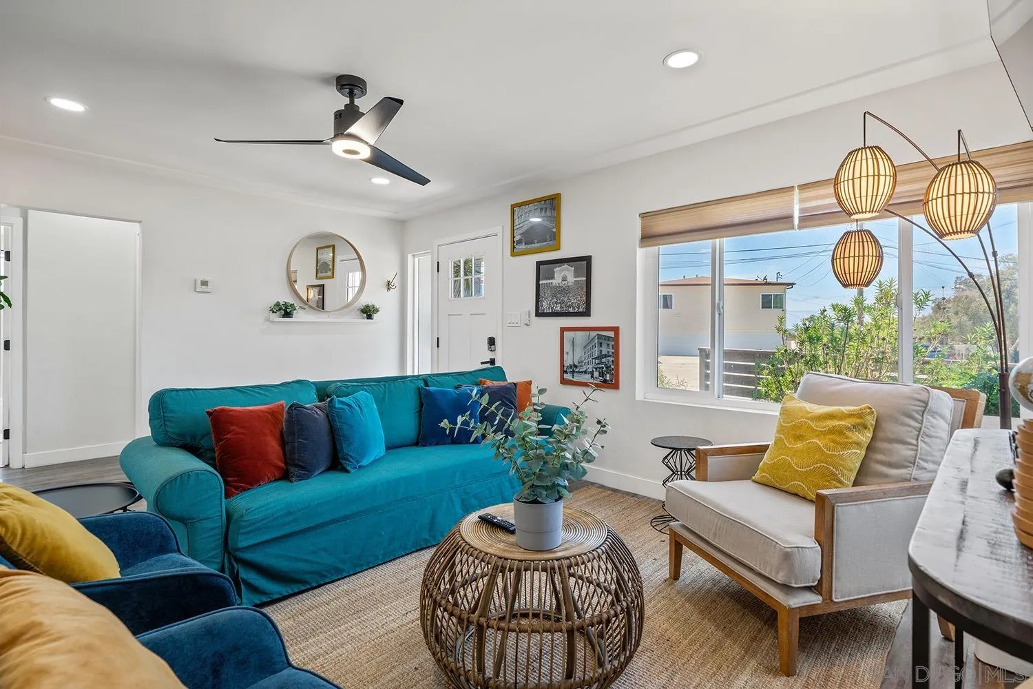 3109 Hawk Street San Diego, CA 92103 - Photo 13 of 75 a living room with furniture and a large window