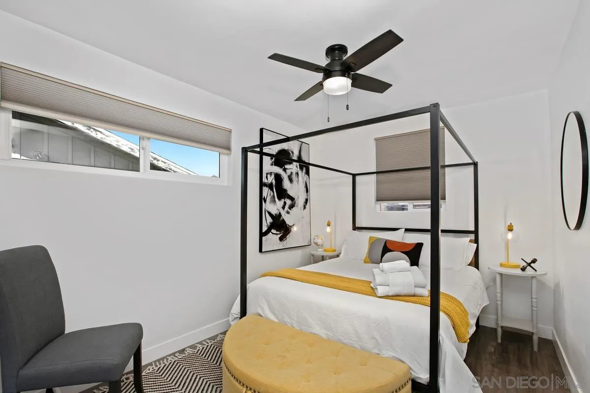 3109 Hawk Street San Diego, CA 92103 - Photo 27 of 75 a bed room with a bed and a chair