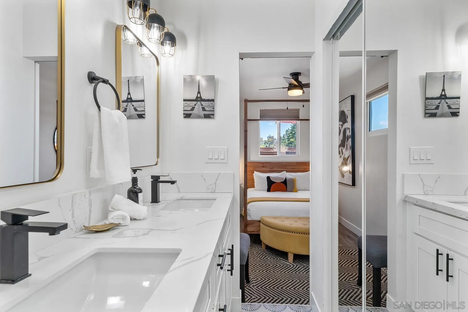 3109 Hawk Street San Diego, CA 92103 - Photo 32 of 75 a en suite bathroom with a double vanity sink a mirror and a shower