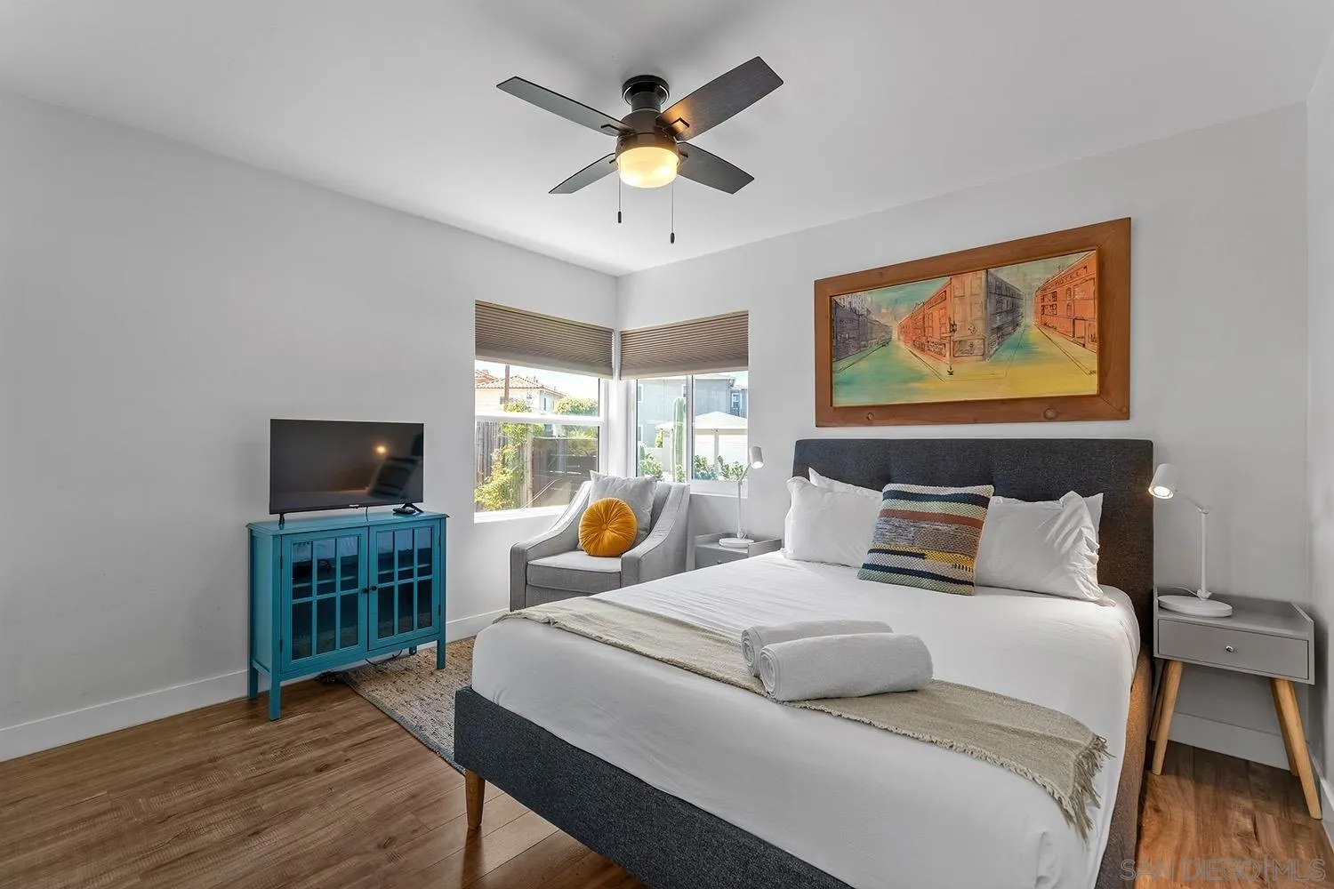 3109 Hawk Street San Diego, CA 92103 - Photo 37 of 75 a bedroom with bed tv and window