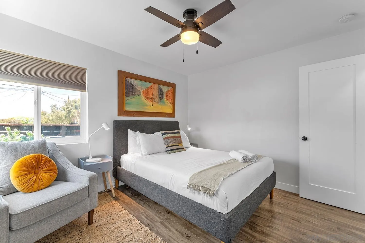 3109 Hawk Street San Diego, CA 92103 - Photo 38 of 75 a bedroom with a bed and a chandelier