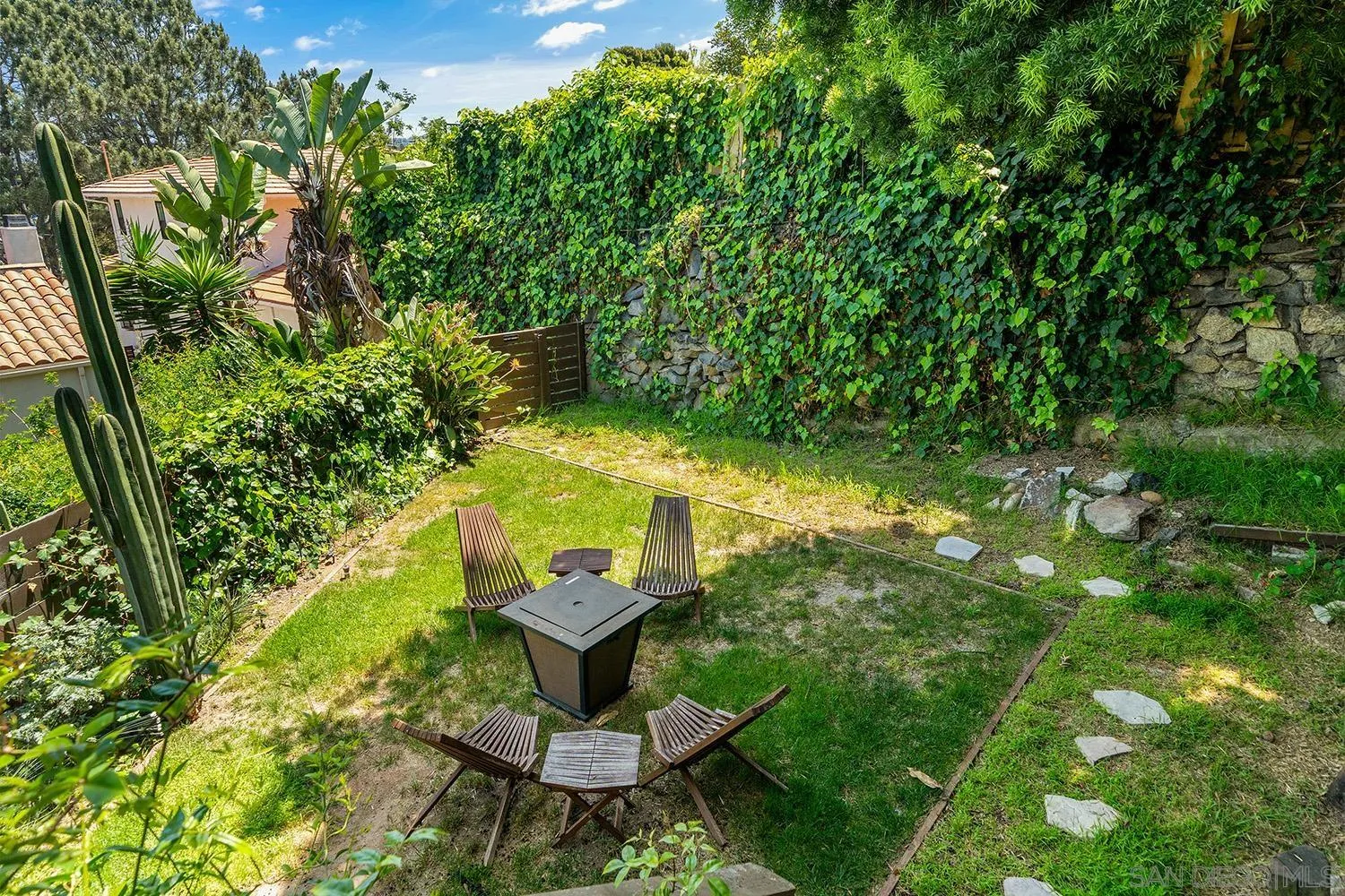 3109 Hawk Street San Diego, CA 92103 - Photo 48 of 75 a view of a backyard with sitting area