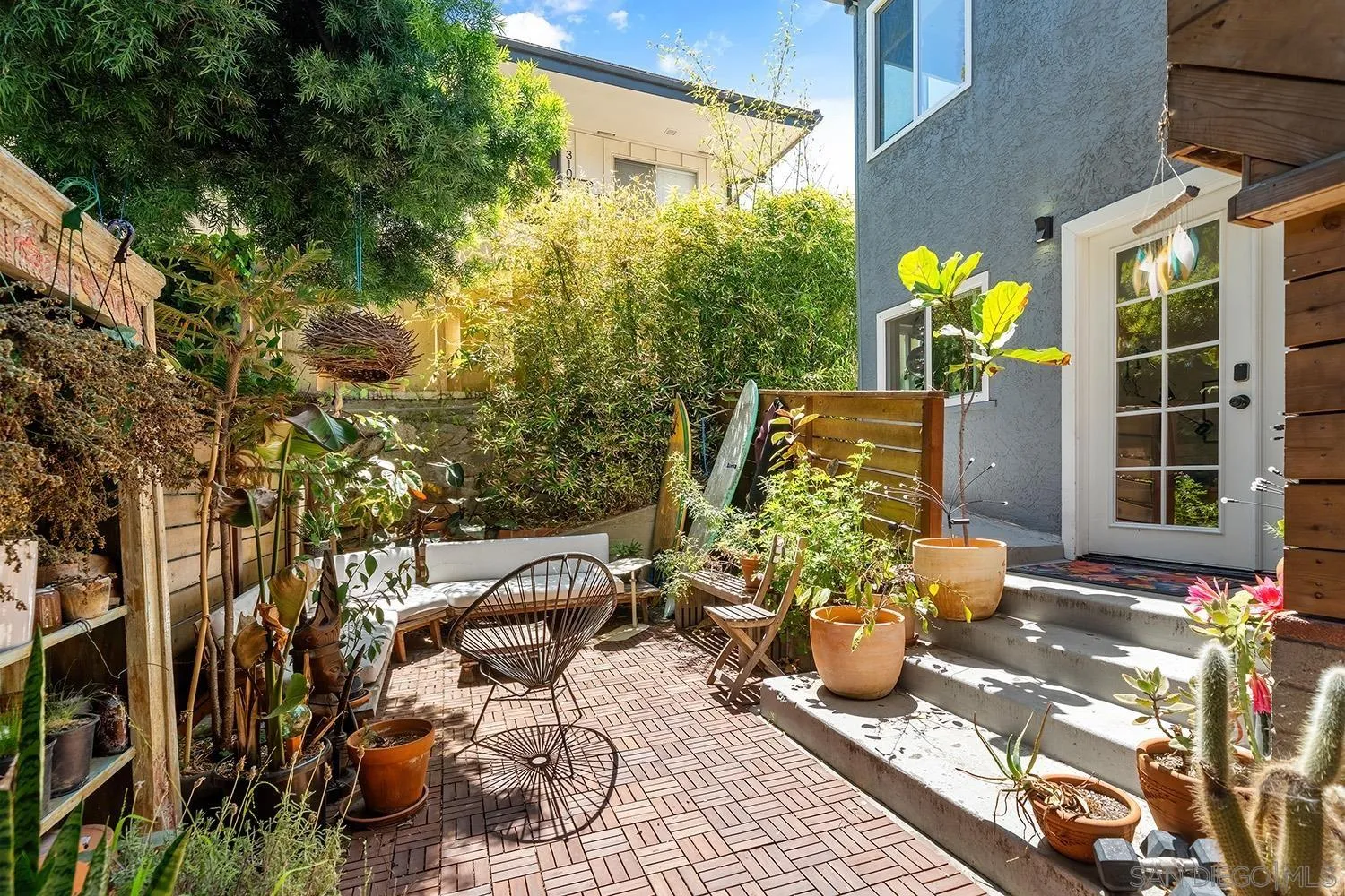 3109 Hawk Street San Diego, CA 92103 - Photo 55 of 75 a front view of a house with outdoor seating