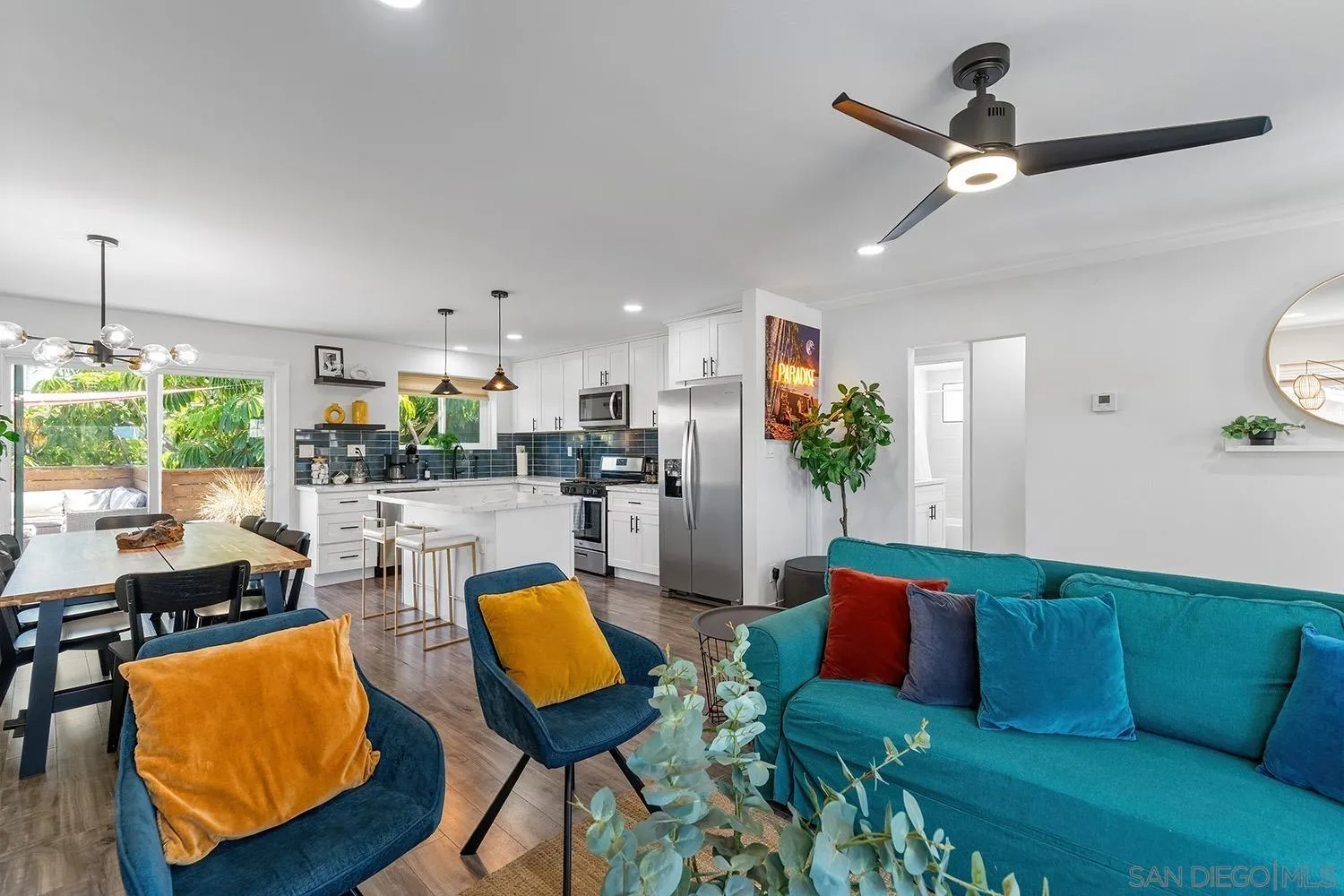 3109 Hawk Street San Diego, CA 92103 - Photo 6 of 75 a living room with furniture kitchen view and a large window
